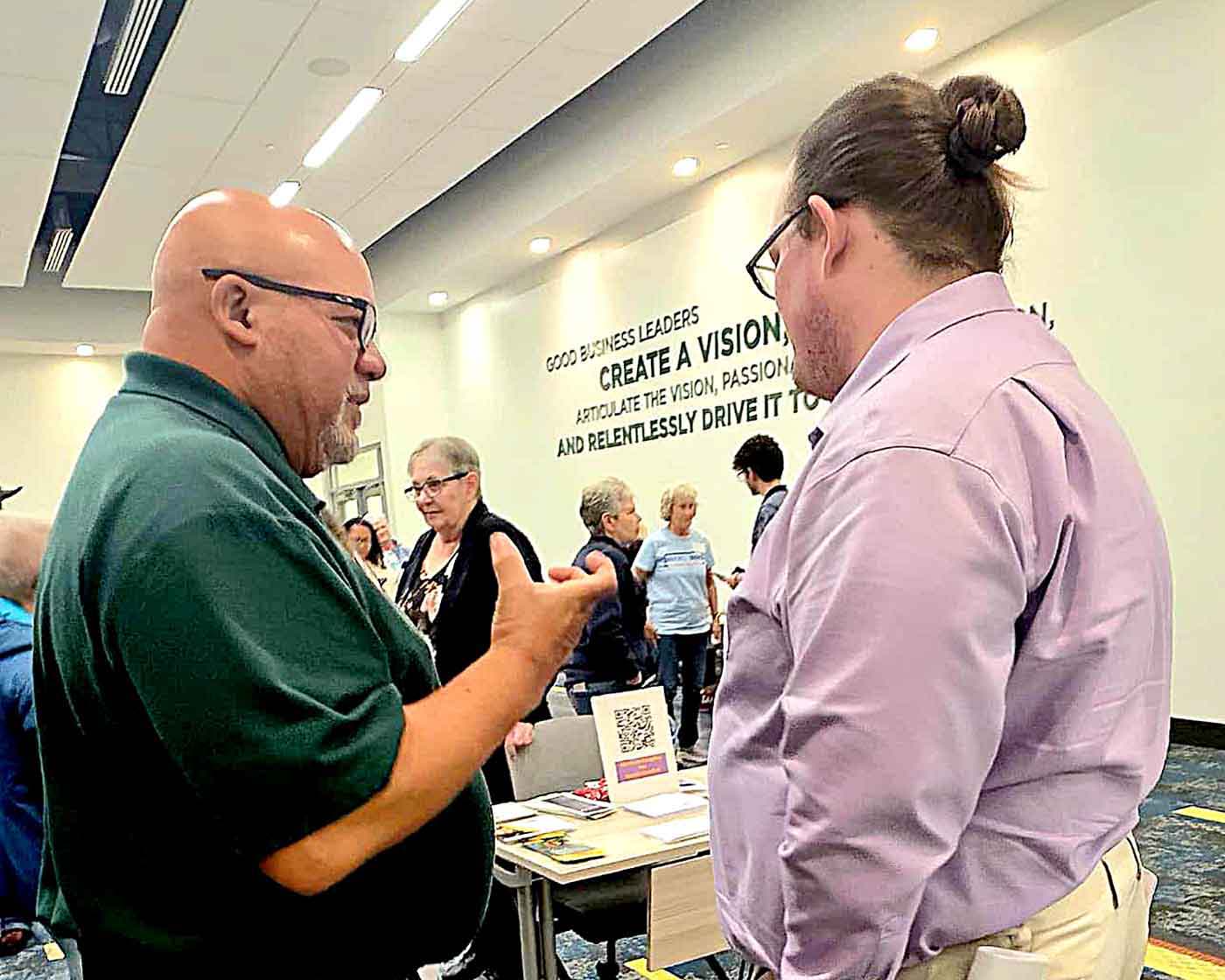 Frank Moore and colleagues discussing community issues