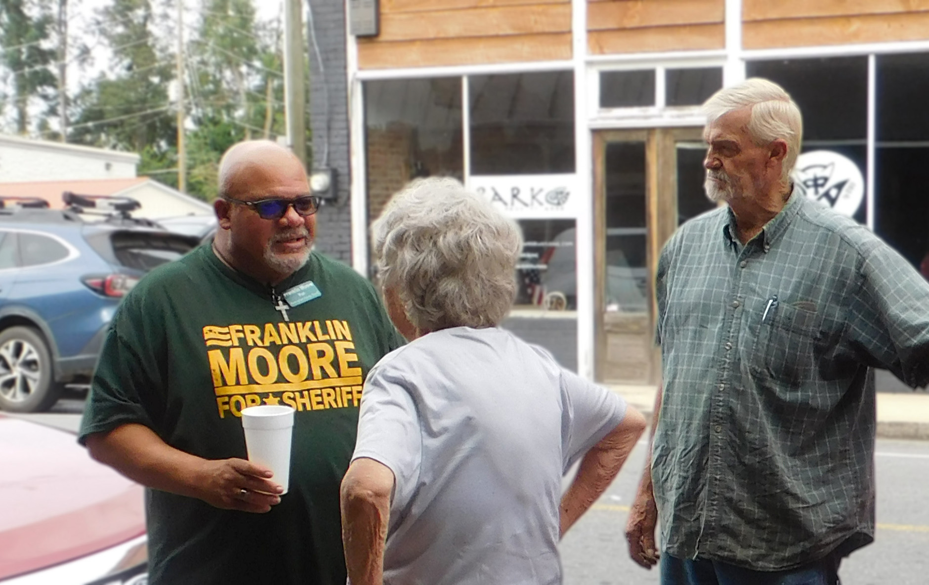 Frank speaking with voters outside