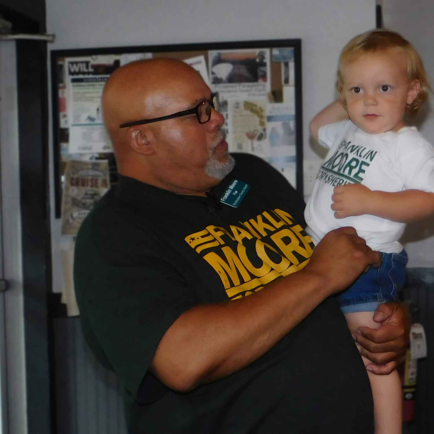 Frank discussing issues with young voter