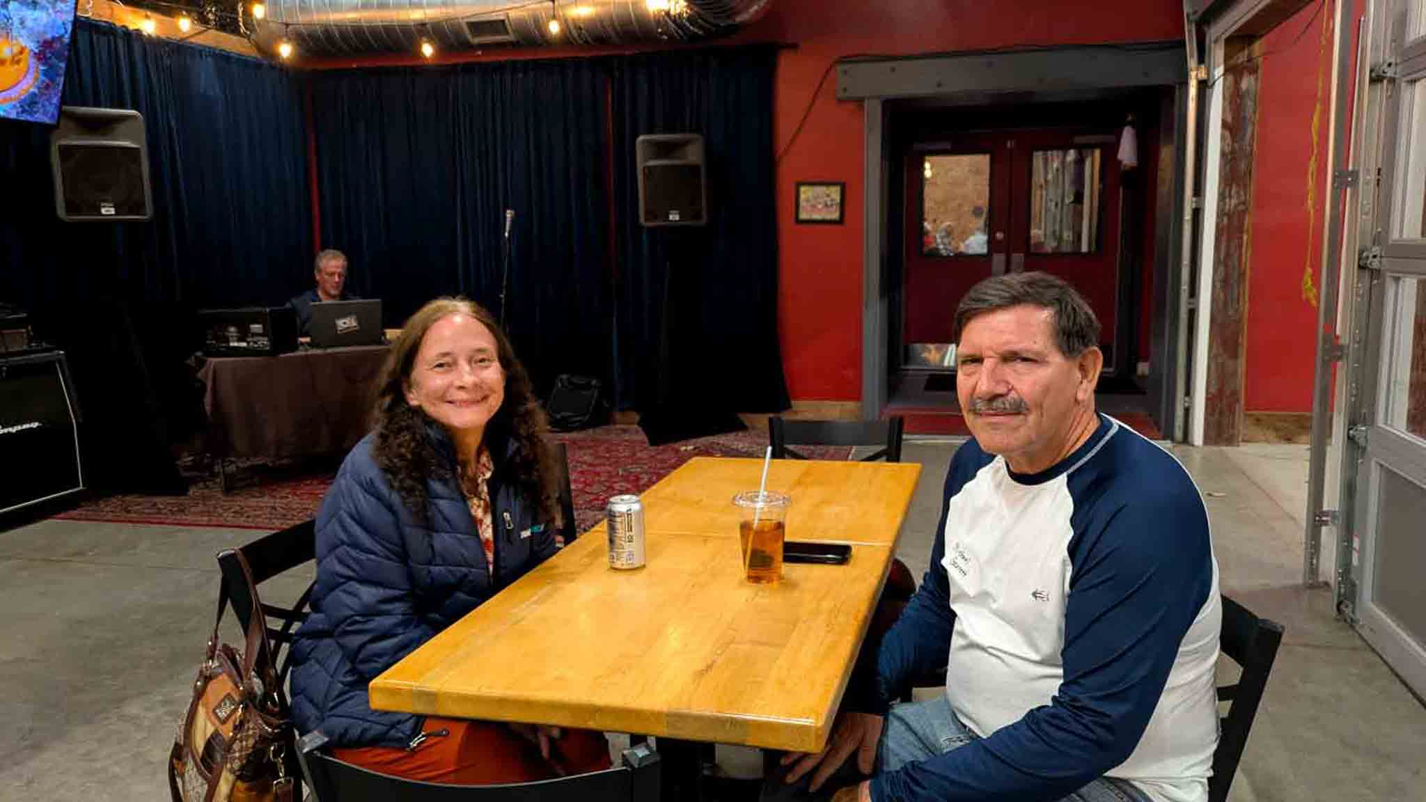Frank engaging with local residents at the brewery event