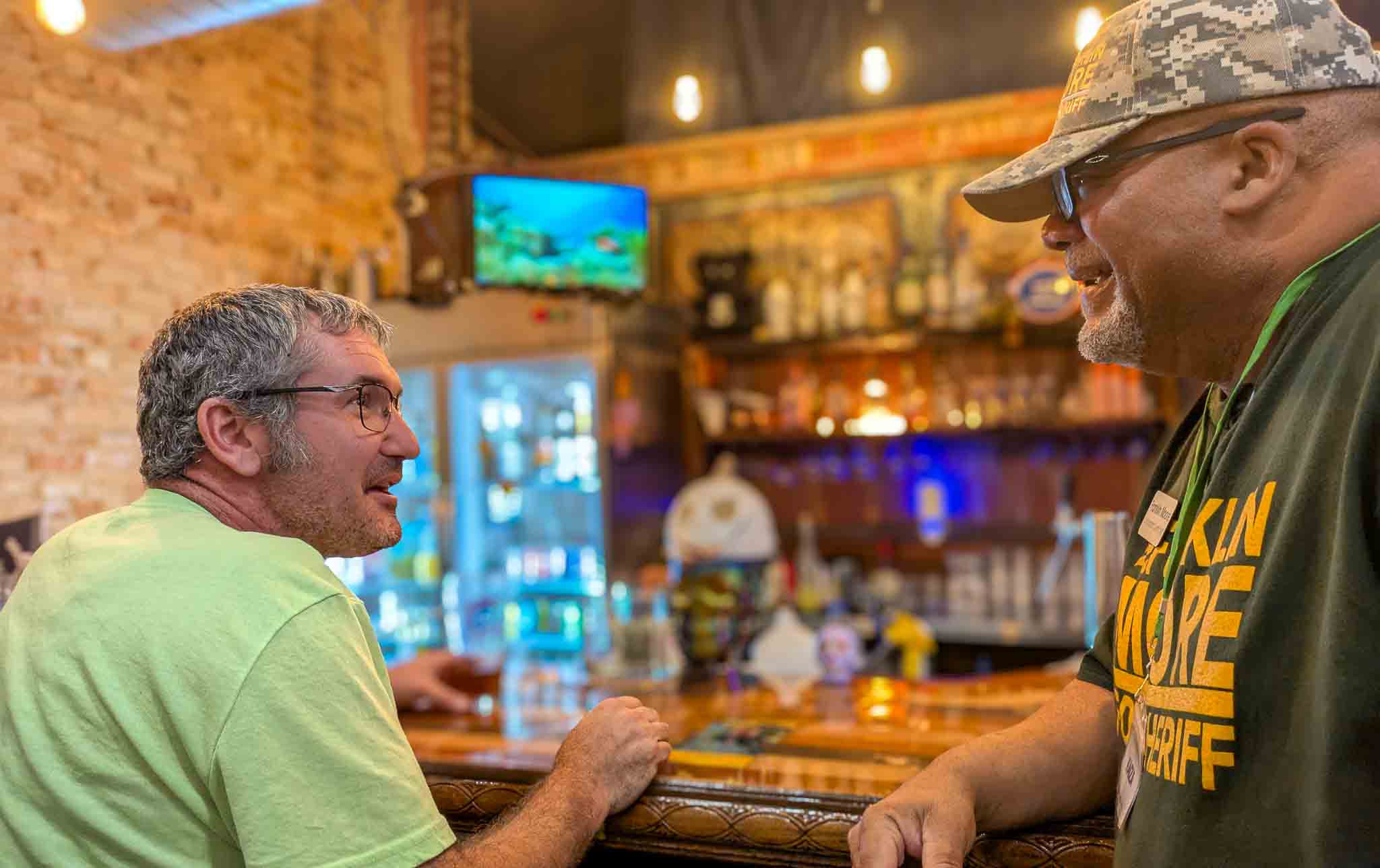 Frank Moore meeting with community members at Lucky City Brewery