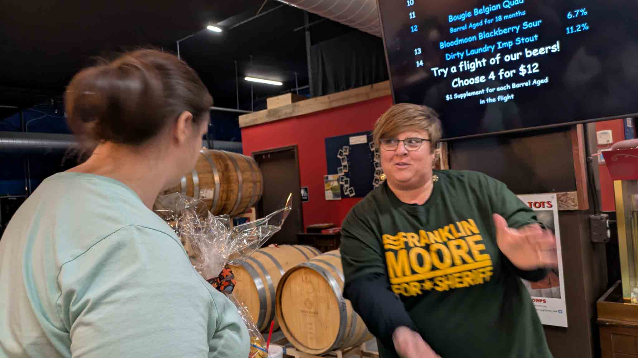 Frank connecting with voters in a relaxed brewery setting