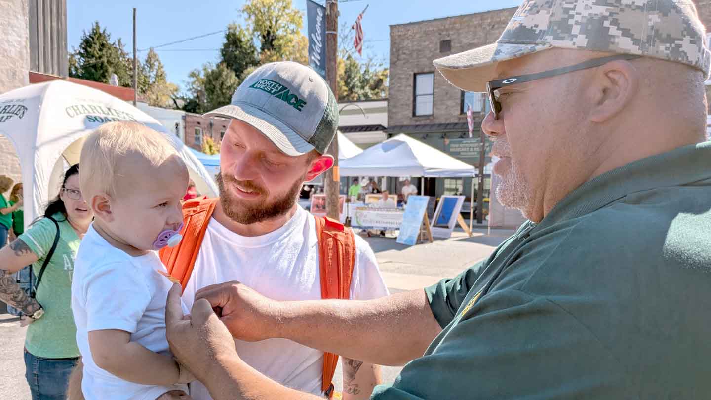 Frank greeting a new deputy at the event