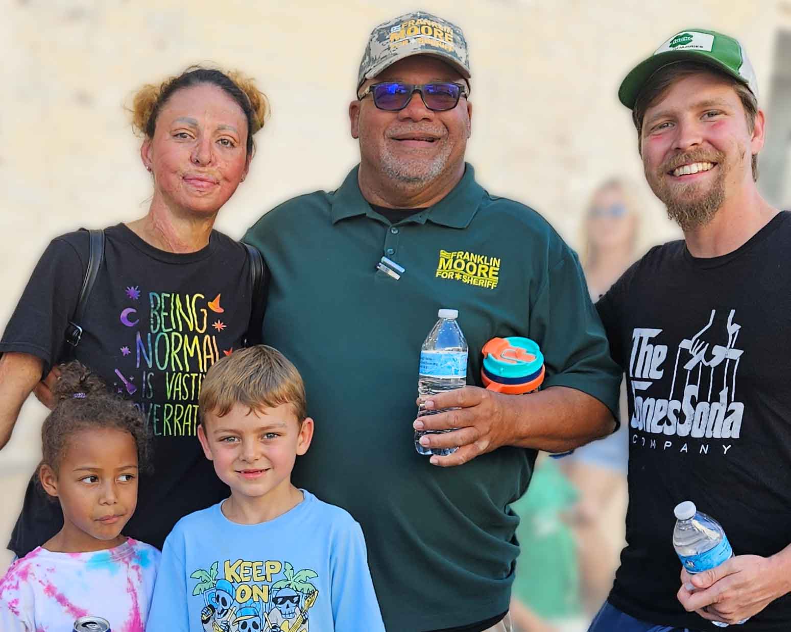 Frank Moore connecting with a young family at the festival