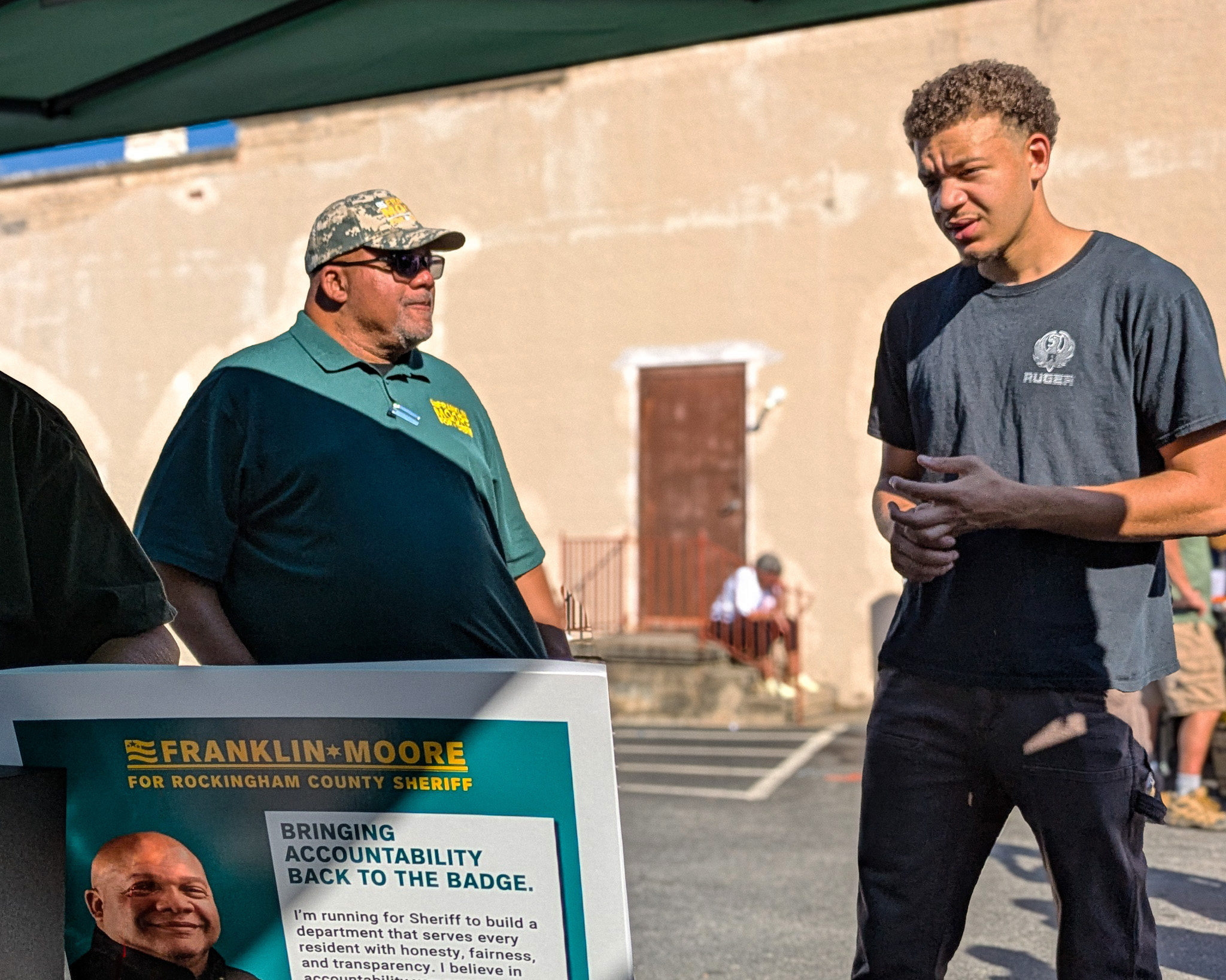 Frank connecting with a young voter at the festival