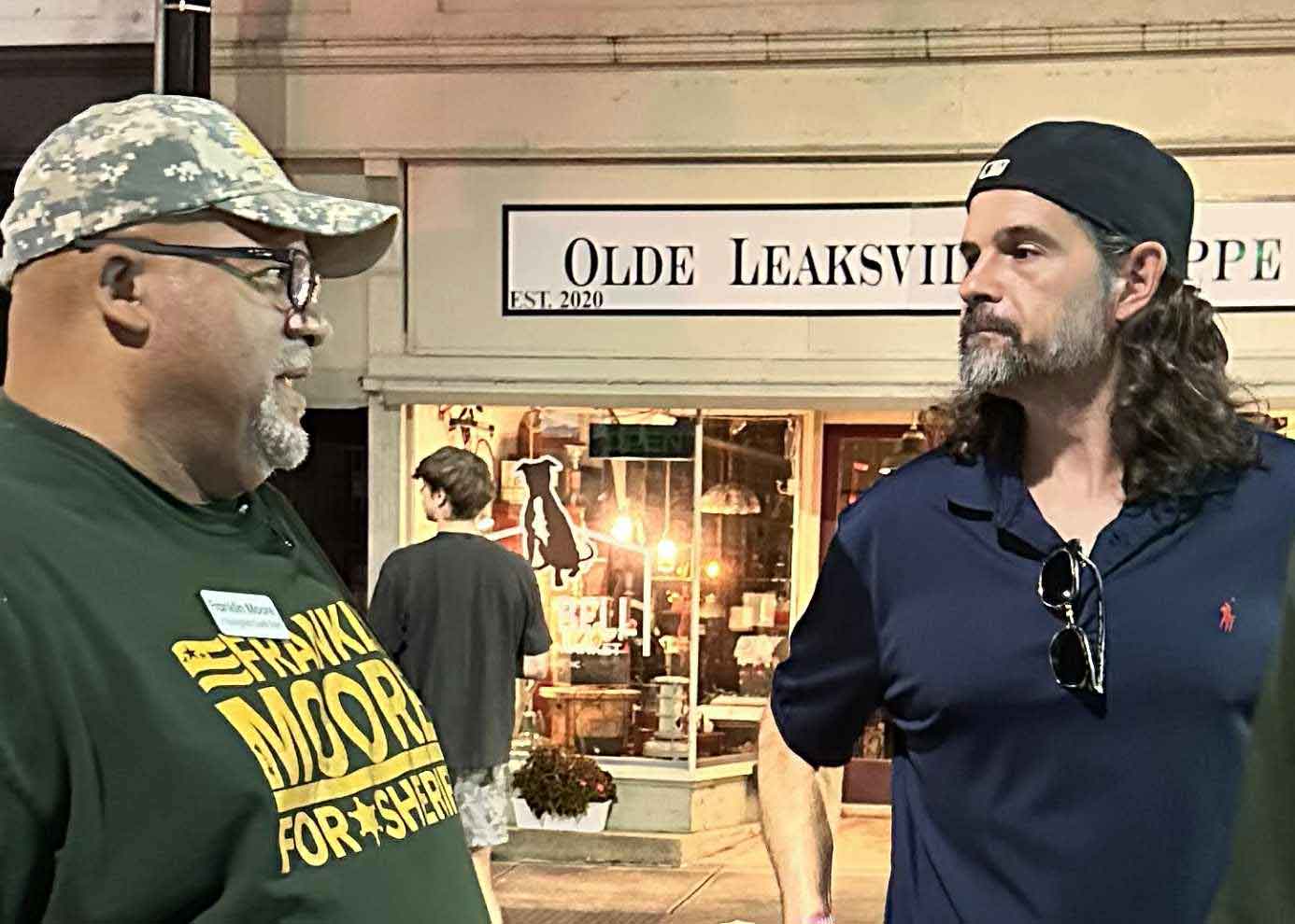 Frank in an engaging discussion with a community member