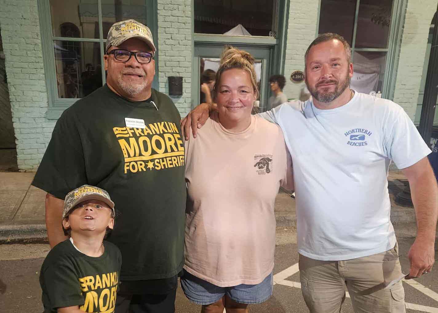 Frank and his son meeting with local residents at the festival
