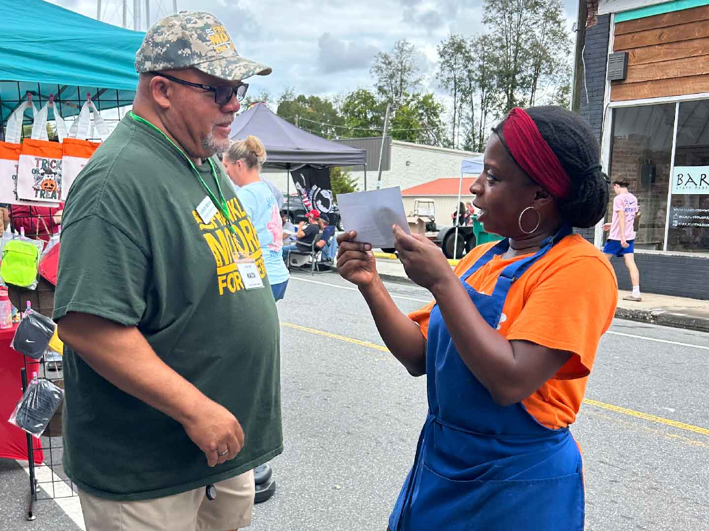 Frank greeting a Stoneville neighbor